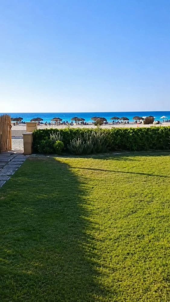 First-Row Beach Chalet with Private Garden | Badr